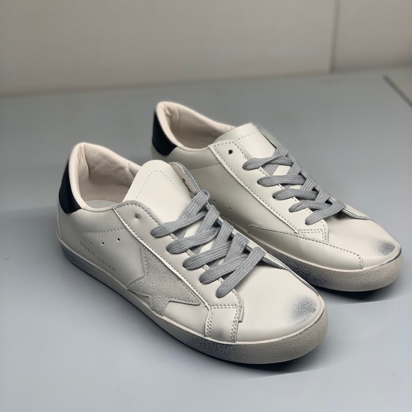 Women’s Distressed Sneaker with grey star detailing in white faux leather - Picture 12 of 13